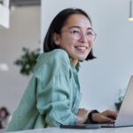 Young woman at laptop.