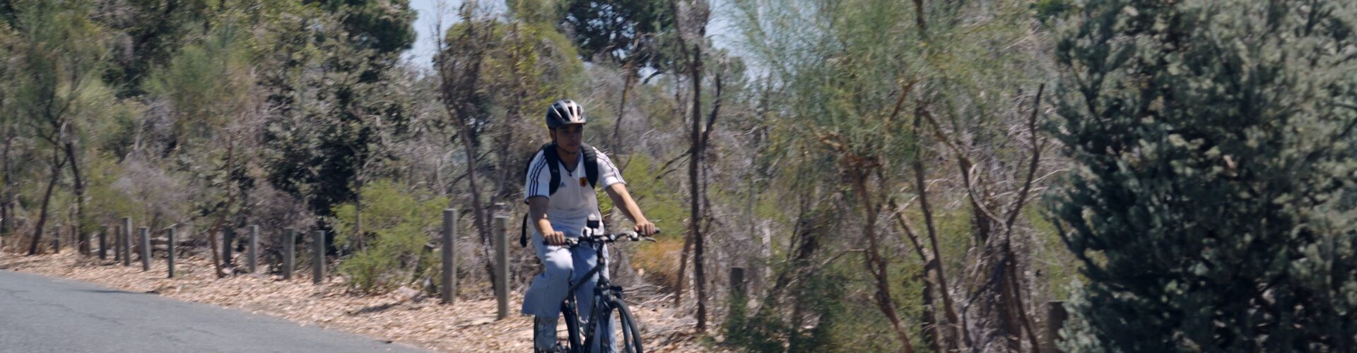 Musa riding a bicycle