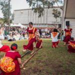 Image of students doing a traditional dance