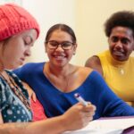 Three students chatting