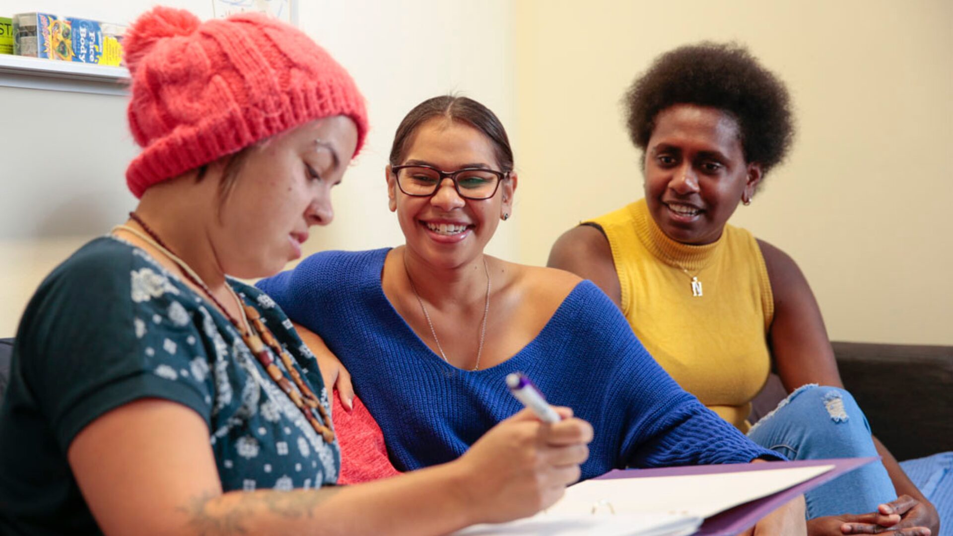 Three students chatting