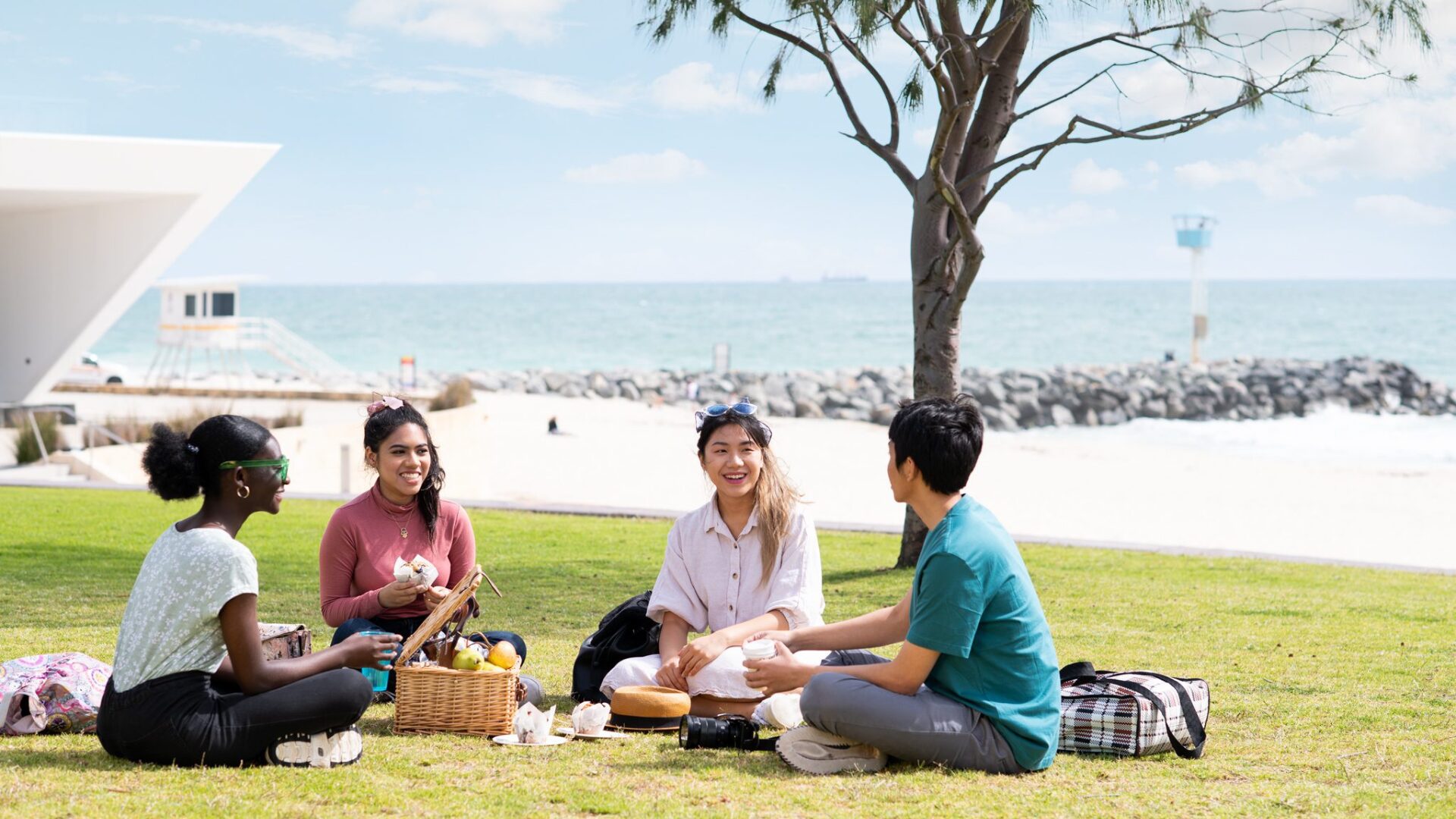 Student having a picnic on the beach