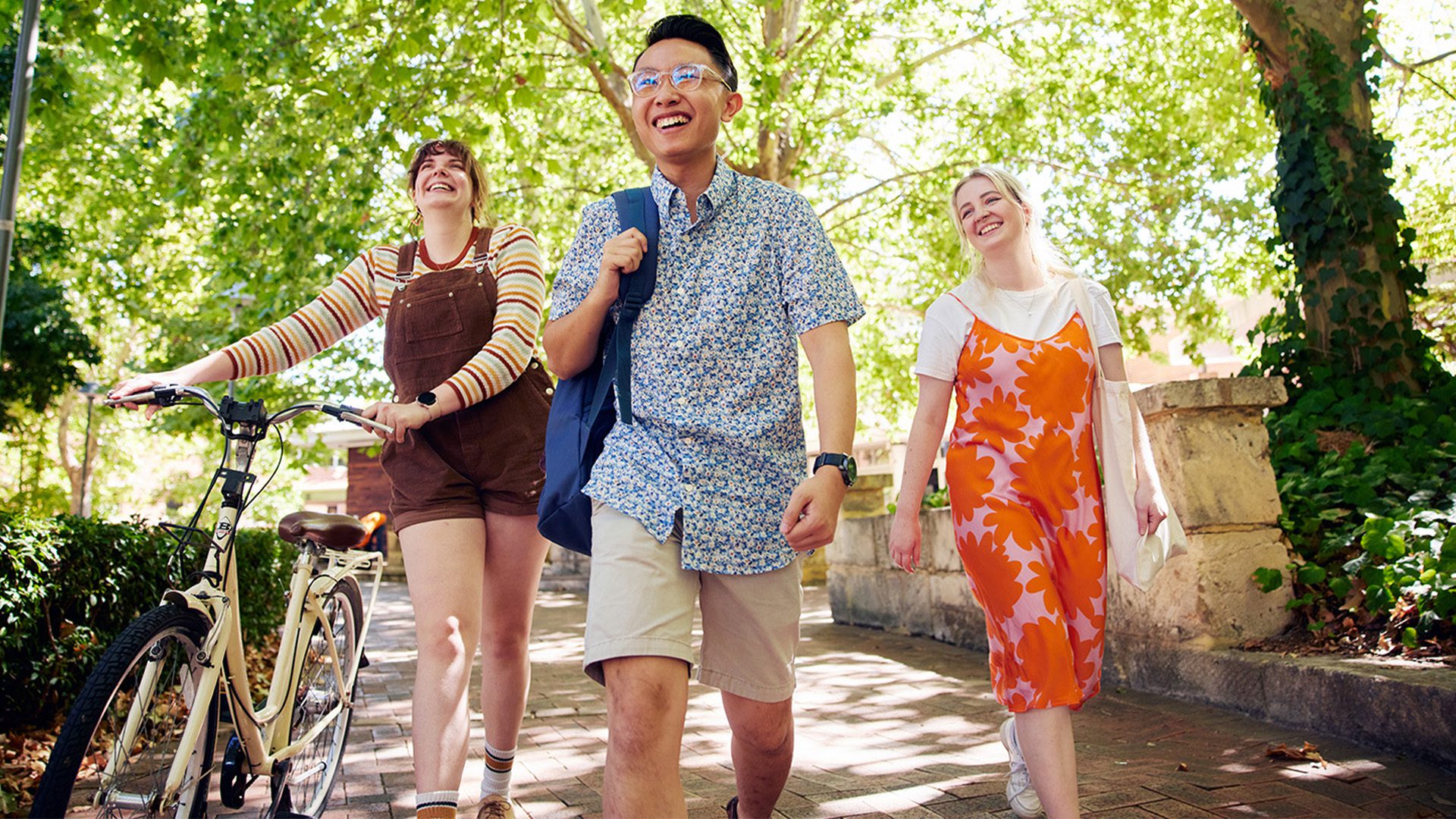Group of students walking together on campus.