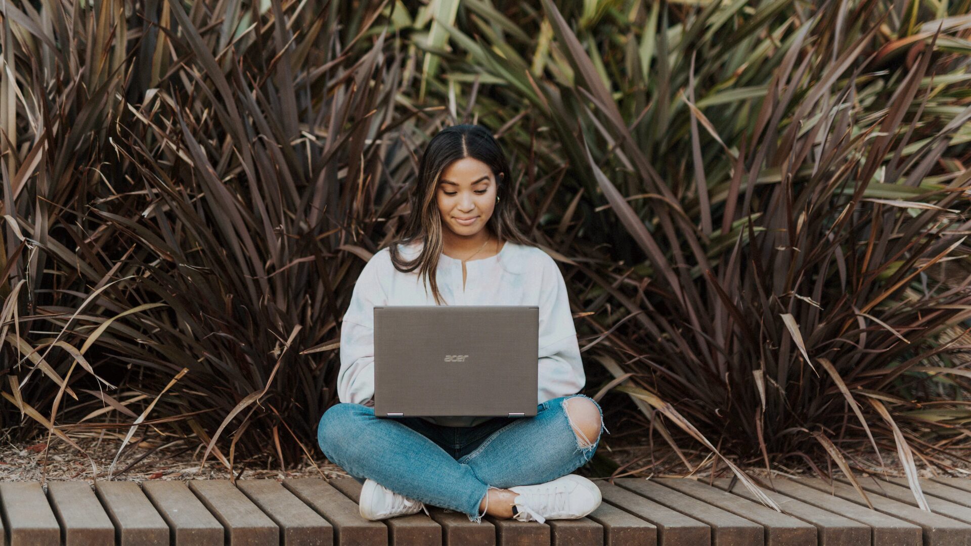 student using her laptop