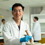 Curtin Pharmacy student Ryan Tan learning to compound medicines