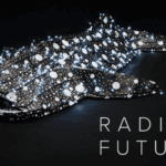 A photo of an artwork with the text Radical Features
