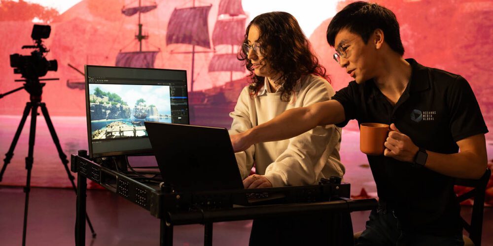 Elena creates virtual production on a computer.
