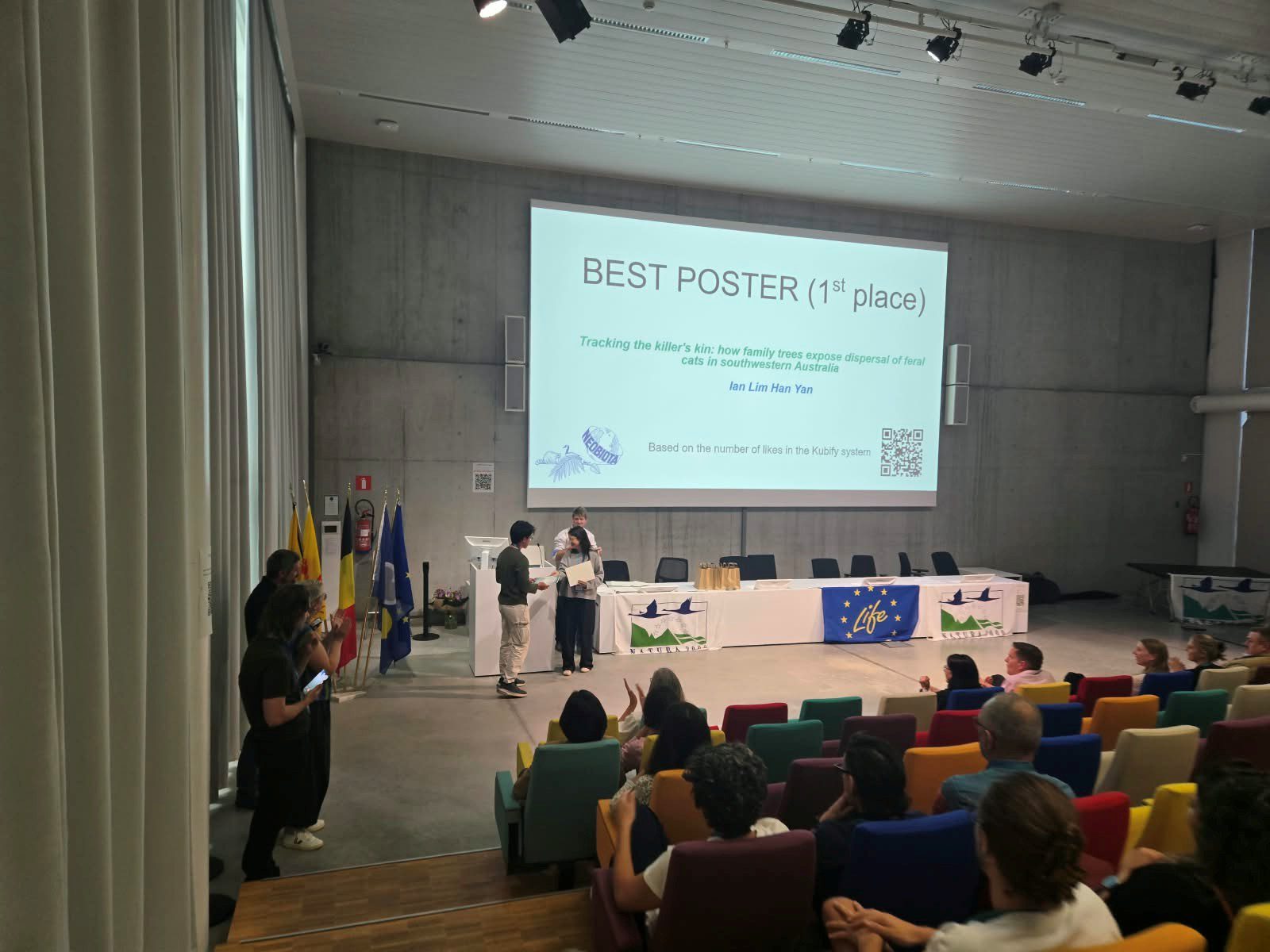 A projection of Ian winning the Best Poster Award