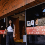 Person outside Curtin Psychological and Counselling Service and AccessAbility Services.