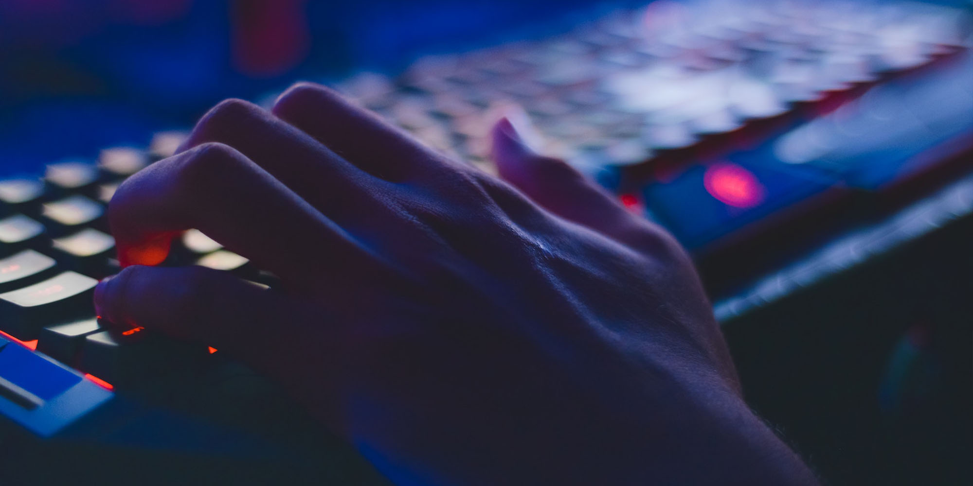 Person typing on a keyboard