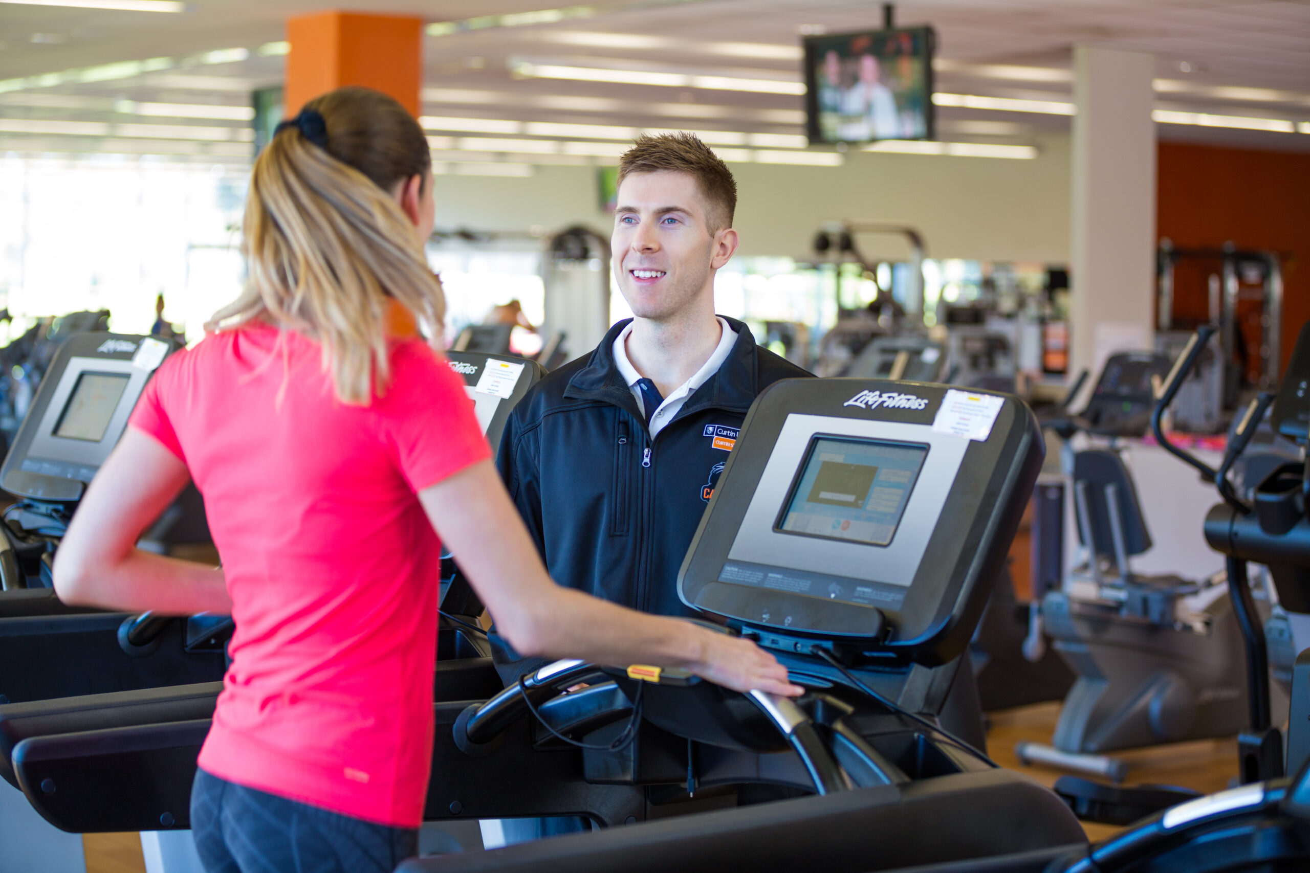 Personal trainer and client at Curtin Gym