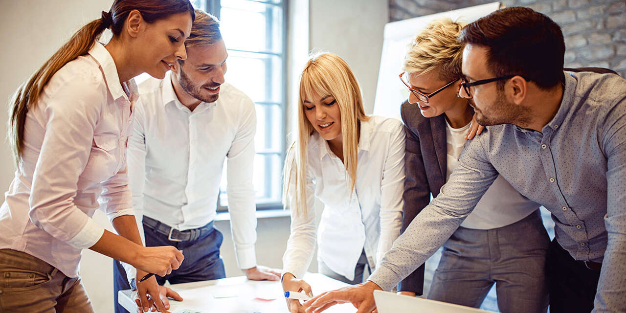 Group of business people around a table