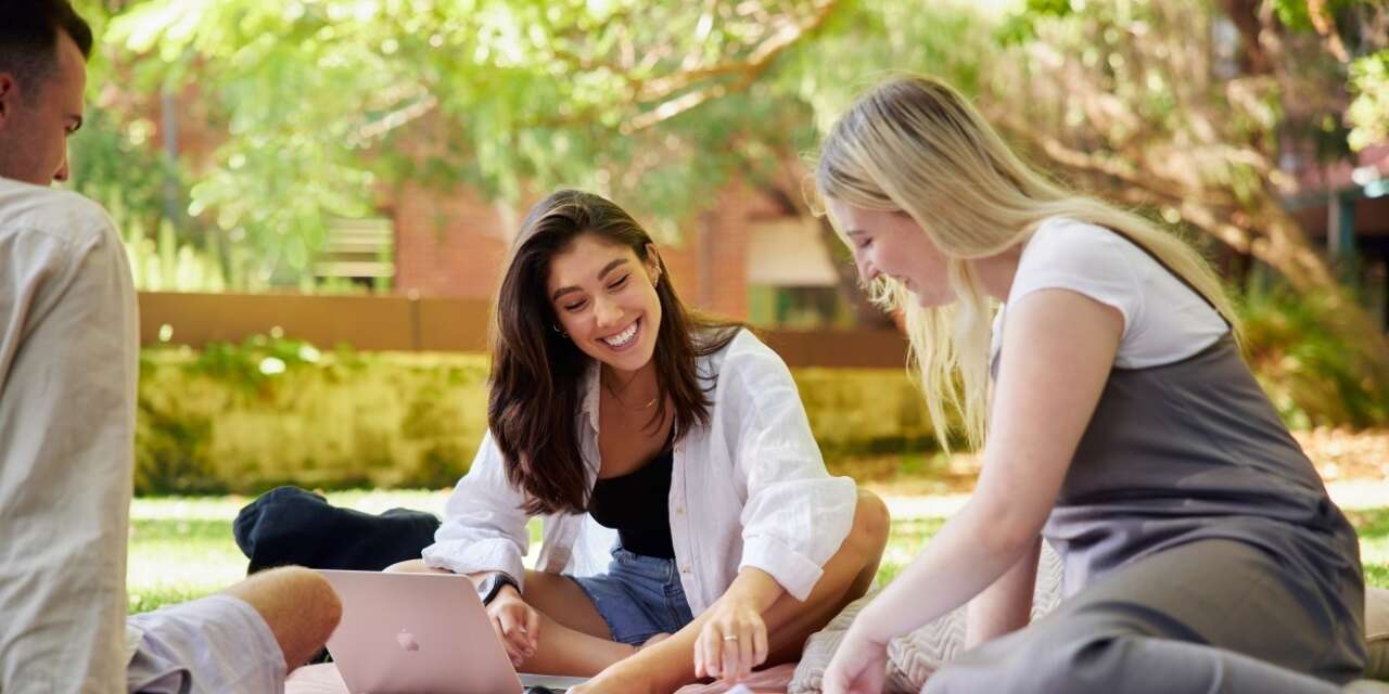 A group of students smiling