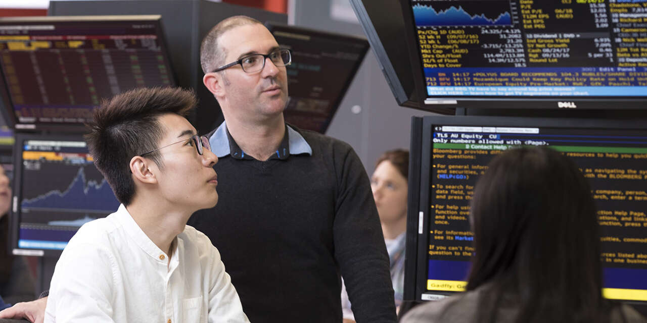 Lecturer and student in the Trading Room