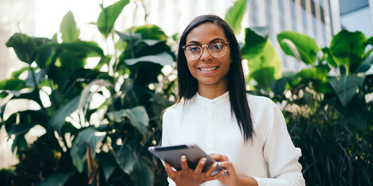 Student holding a tablet