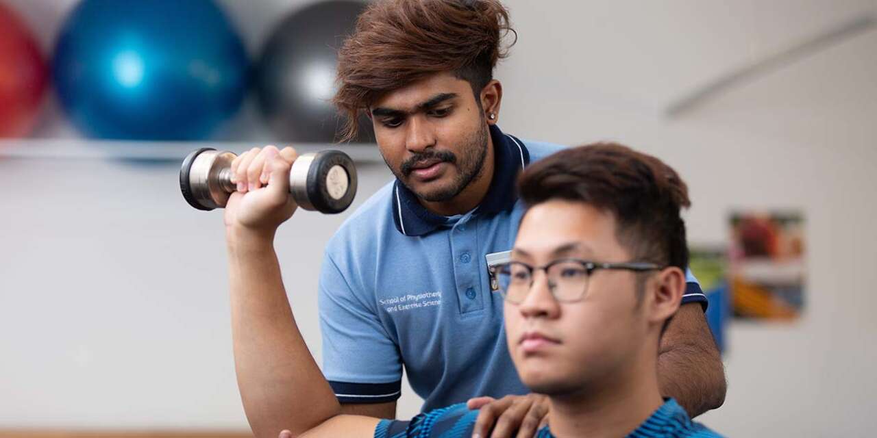 Male Physio student in learning setting