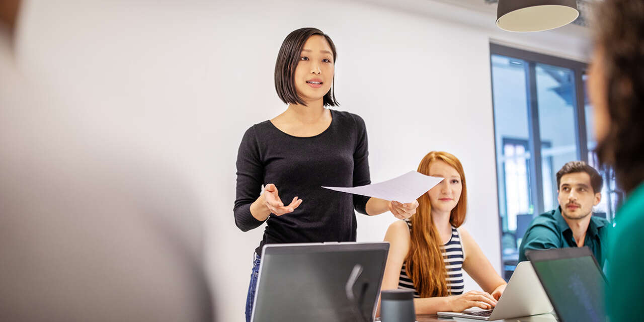 Student presenting in a meeting