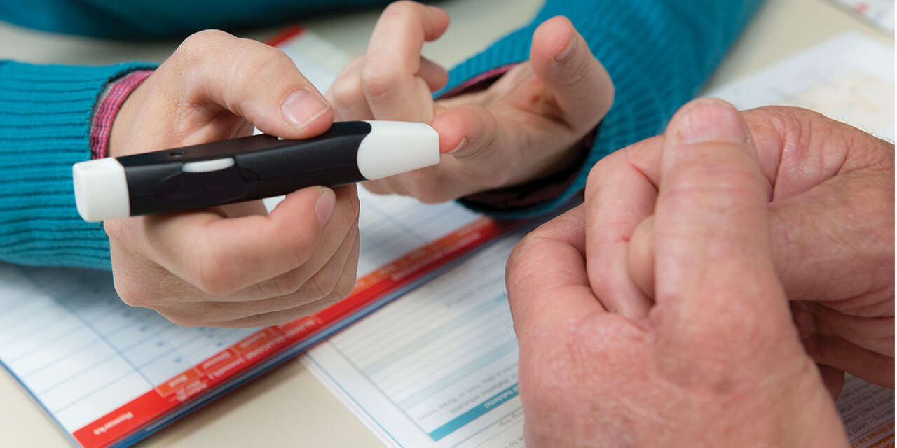 Diabetic patient using glucometer