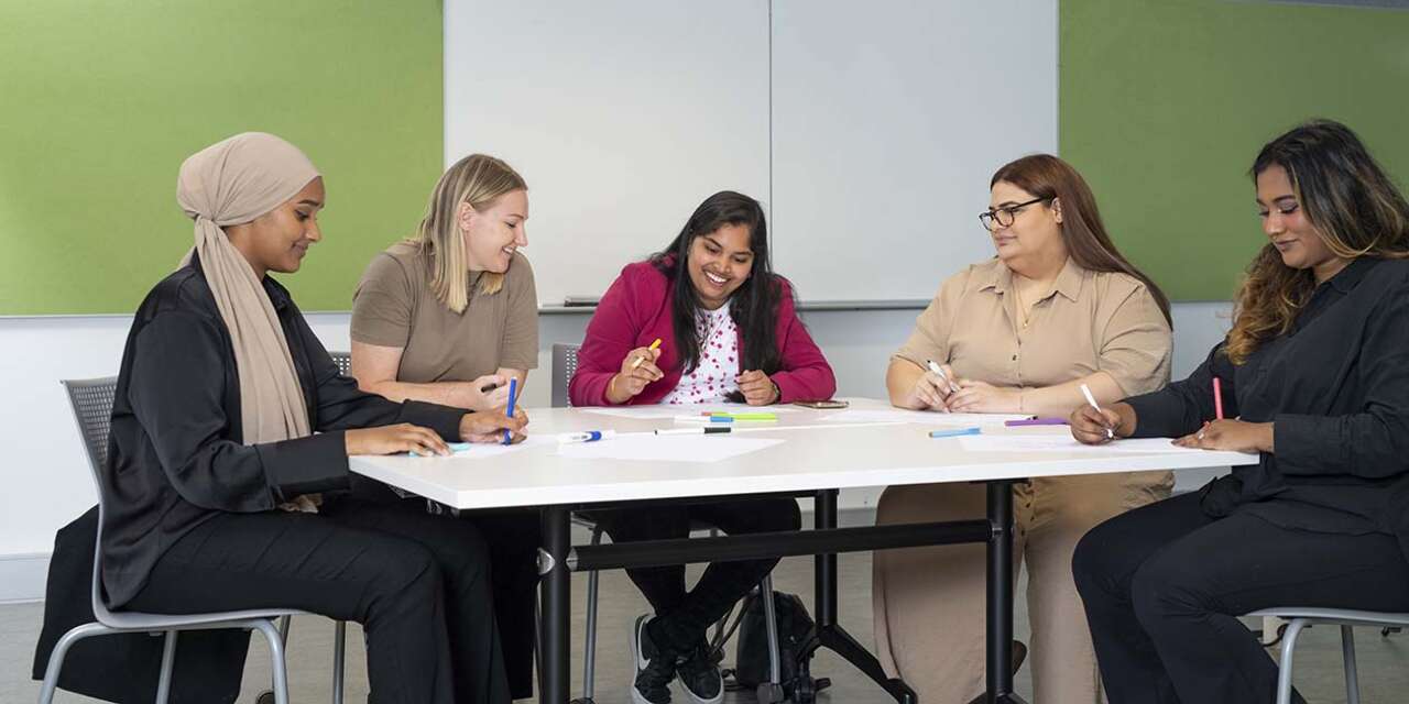 Group of students sitting at a table