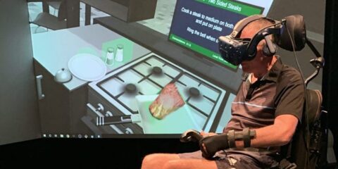 Man with spinal injury using VR to re-learn how to move