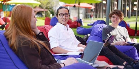 Group of students sitting on bean bags