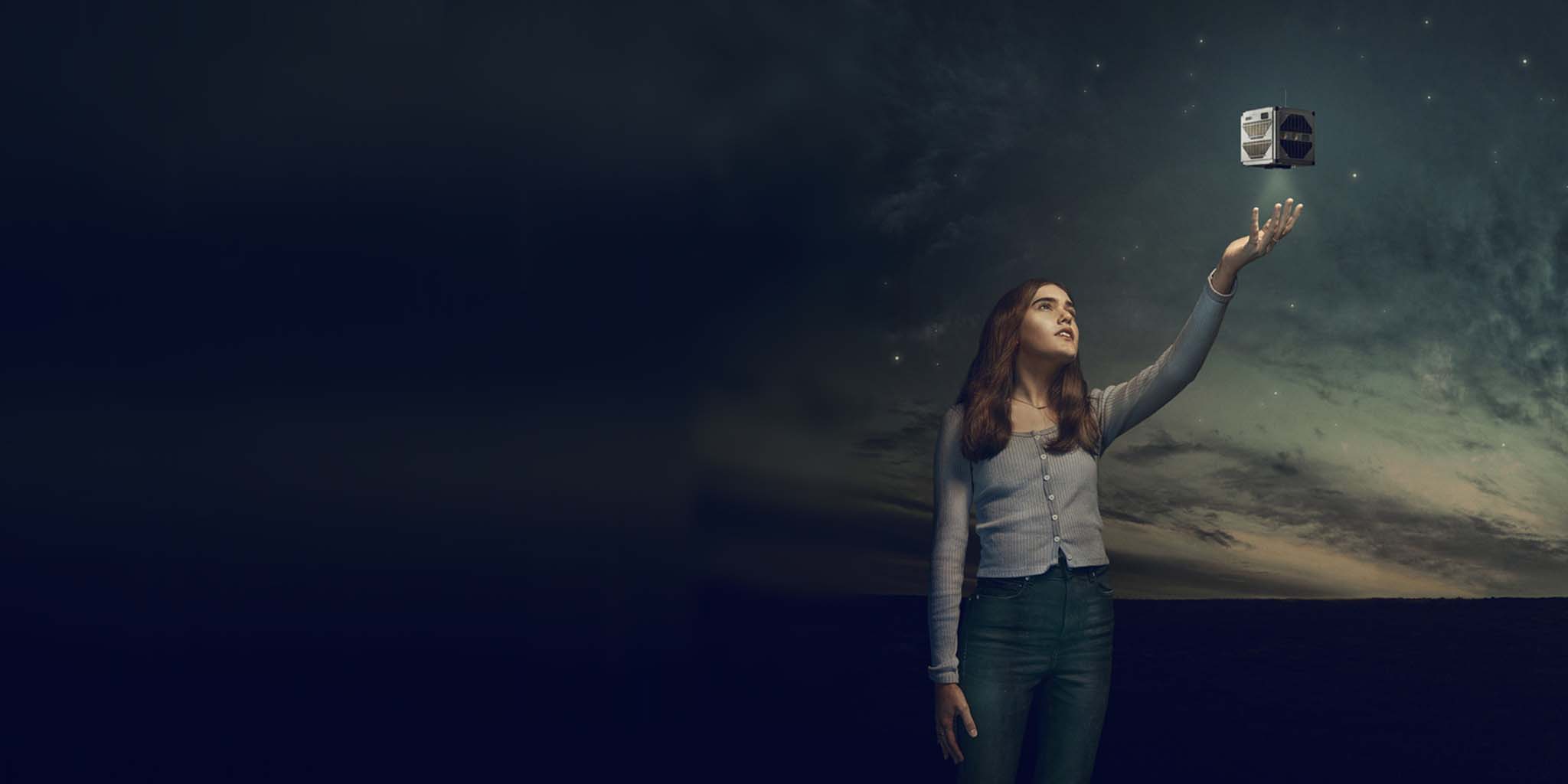 Female holding elevated science equipment