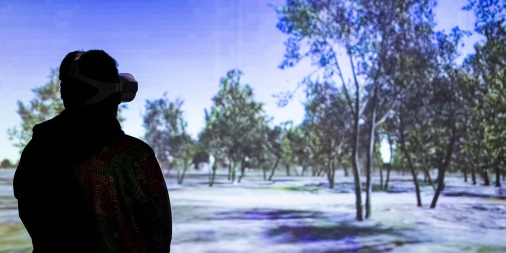Timothy Flowers viewing MissionsConnect. 2021. Photo Credit_Stolen Generations Immersive Hub and Callum Smith